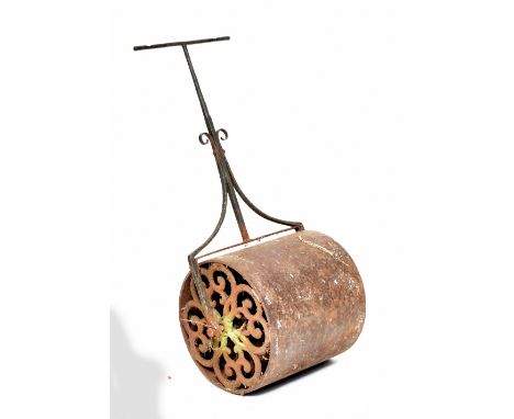 A vintage cast iron garden roller (af).