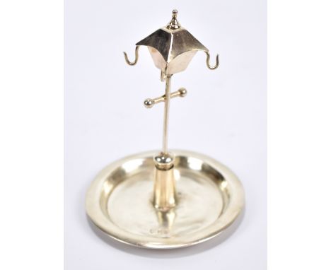 WILLIAM NEALE LTD; a George V hallmarked silver ring stand modelled as a street lantern, on circular dished base, Birmingham 