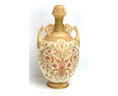 ROYAL WORCESTER; a very large Persian pattern vase with pierced neck, twin scrolling handles and elaborate floral decoration 