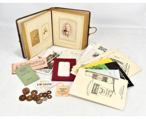 A small group of ephemera including a portrait photo album and topographical postcards, also a South African Memorable Order 