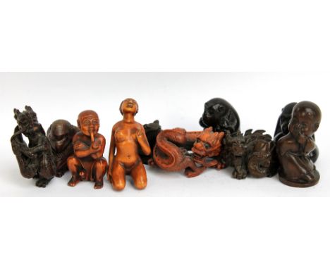 A quantity of decorative modern netsuke and other items.&nbsp;
