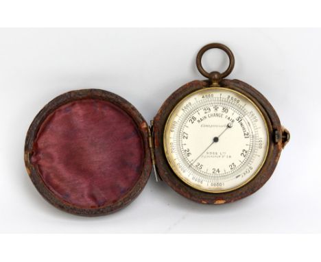 A cased brass pocket barometer, inscribed to the dial 'Compensated' Ross Arrow SS Ltd 31 Coxburgh St S.W.