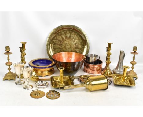 A group of metalware including a gold plated Gubelin Mystery Floating Turtle water clock, two ejector chamber sticks (both af