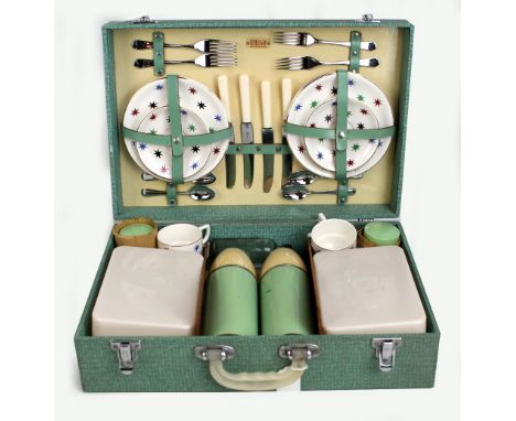 A Sirram picnic set including two Thermos flasks, two lunchboxes, three glass jars, ceramic cups, saucers/side plates, knives