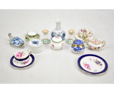 A small collection of miniature ceramics to include a Foley floral transfer decorated cup and saucer, a Royal Crown Derby Ima