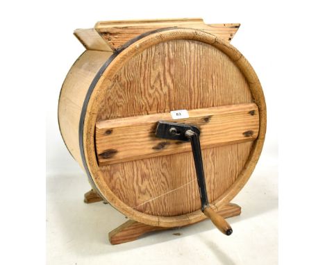 A rustic pine rotary dryer with strapwork decoration and simple handle, height approx 50cm.Additional InformationSplits and s