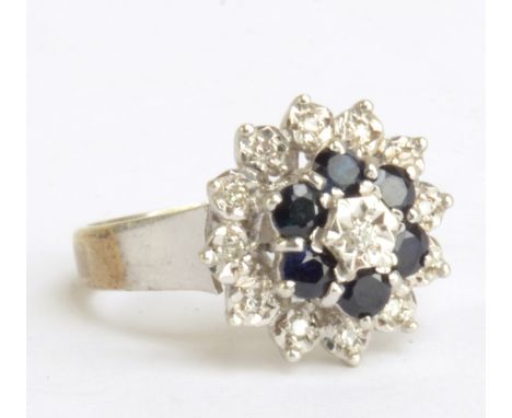 A 9ct white gold sapphire and diamond floral dress ring, size O, approx 5.1g.