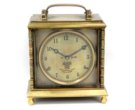 SMITHS; a brass cased mantel/desk clock, the circular dial set with Arabic numerals, manufacturer's mark and further stamped 