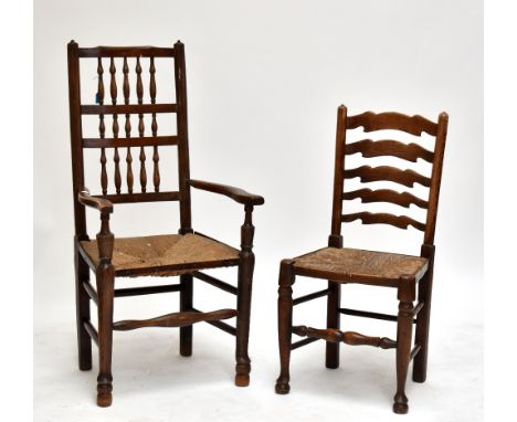 A spindle back rush seated elbow chair and four ladder back rush seated side chairs (5).