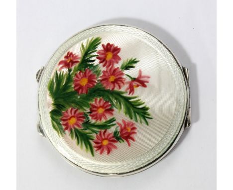 A George VI hallmarked silver and enamel decorated circular compact, Birmingham 1948, diameter 7cm.