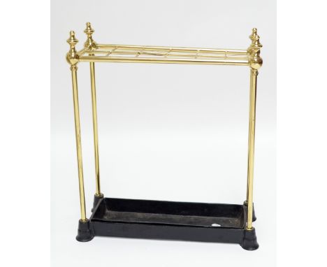 A brass twelve division stick/umbrella stand with cast iron base and tray, height 61cm.&nbsp;Additional InformationGeneral we