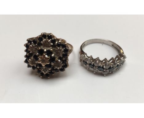 A white metal diamond set half hoop ring, size O, approx 3.2g, and a 9ct yellow gold floral dress ring, size L, approx 4.9g (