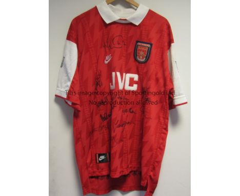 ARSENAL AUTOGRAPHS     A 1995/6 red shirt which is multi-signed by 15 players including Wright, Bergkamp, Seaman. Includes a 