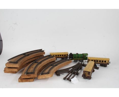 Model railway tinplate engine and rolling stock, marked "made in Great Britain", quantity of track (qty)