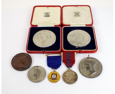 A 9ct gold and enamel George V and Queen Mary Coronation medal, a presentation from the borough of Warrington, within fitted 