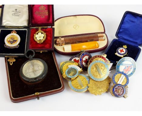 A collection of gilt metal and enamel badges, mainly horse related, together with a Newton & Co, 3 Fleet St, London, compass 