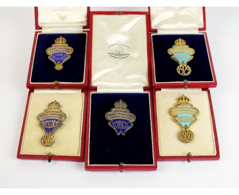 Five silver gilt and blue enamel British Dairy Farmers Association badges, each within fitted case (5)