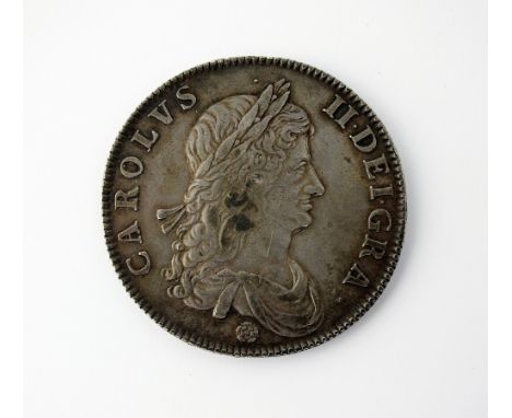 A Charles II crown, dated 1662, first bust, rose below bust, undated edge, ref S.3350 