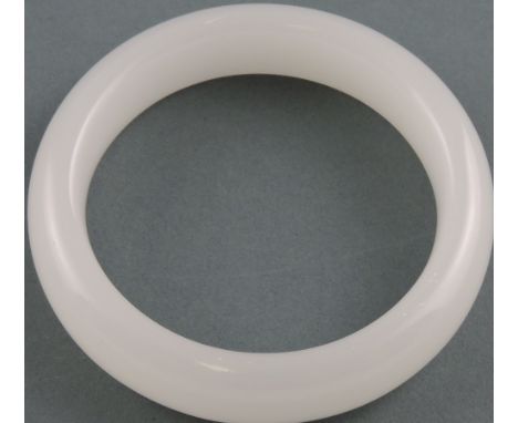 A Chinese white jade bangle. 