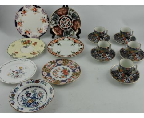 A set of 5 Japanese coffee cans and saucers, together with an assortment of six plates and one dish