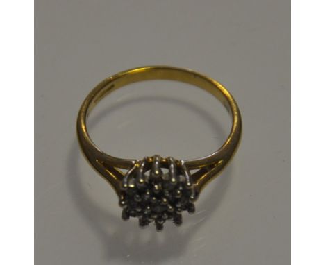 A 9ct gold diamond cluster ring