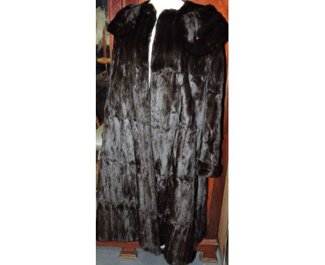 A three quarter length mink coat by Polatchik of Notting Hill Gate, London