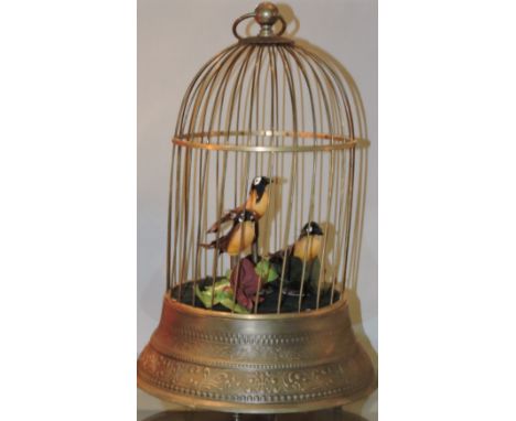 A Victorian automaton brass bird cage with three singing birds, h:29cm
