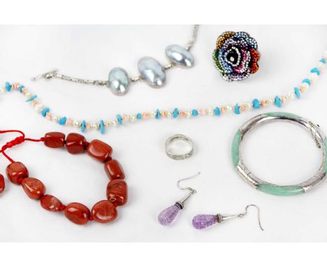 A selection of costume jewellery. To include a Butler &amp; Wilson flower dress ring, within original packaging, a pair of si