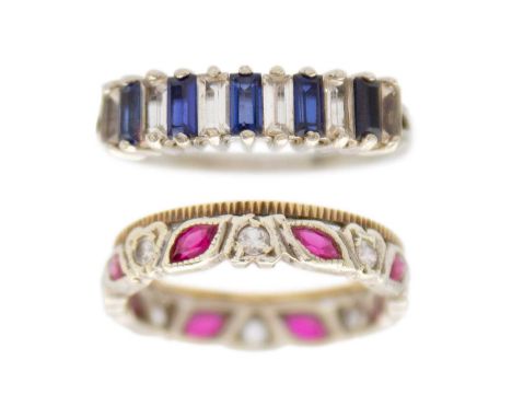 Two 9k white gold band rings. Including a synthetic, marquise-cut ruby and round, white spinel eternity two-tone gold ring, s
