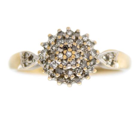 A 9k gold diamond cluster ring. The head size is 9mm in diameter, the melee white diamonds are 0.25ct in total, stamped 375, 