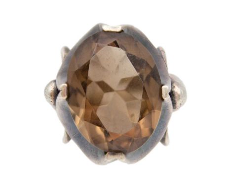 A large smokey quartz in chunky silver frame cocktail ring Oval mixed cut citrine, 1.5x2cm, approx 15.5ct big, in four claw s