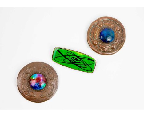 An Alice Lund Denmark glazed pottery brooch. Stamped mark, length 6cm; together with two Arts &amp; Crafts copper and enamel 