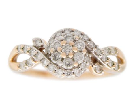 A 9k rose gold diamond cluster ring. Of a crossover design, brilliant cut diamonds are 1.5mm approx, hallmarked Birmingham, s
