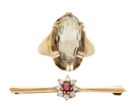 A 9ct garnet and CZ cluster bar brooch, and a 9ct smoky quartz cocktail ring. The brooch stamped 375 and ASJ, 38mm length, 1.