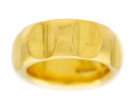 PALOMA PICASSO FOR TIFFANY & CO - A heavy 18k gold groove band ring. Signed 'Paloma Picasso, Tiffany &amp; Co.', the band wid
