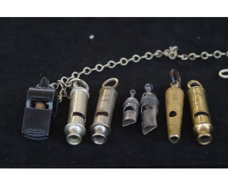 Collection of various vintage whistles 