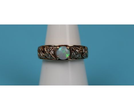 Gold opal &amp; diamond ring