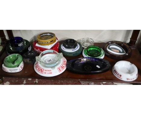 Shelf of pub advertising ashtrays