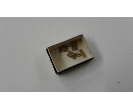 A pair of 9ct gold engine turned cuff-links, approx. 5.6gms