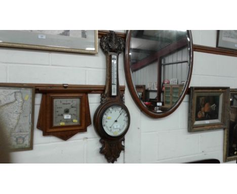 An early 20th Century oak barometer 