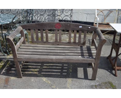 WOODEN GARDEN BENCH, CARVED IN THE SHAPE OF A ROSE TO BACK