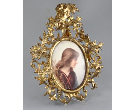 A Berlin KPM plaque, late 19th century, decorated with a portrait of Ruth, signed, 22 x 16cm, housed in an ornate Florentine 