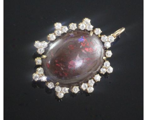 A Victorian style gold, black opal and diamond set pendant brooch, the oval opal measuring approximately 23mm by 17mm and bor