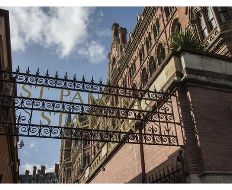 A pair of cast iron gates made from the railing panels at St Pancras Station height 9ft, width 6ft.