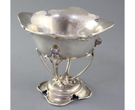 A George V Art Nouveau Scottish silver and amethyst cabochon set tazza, by Elkington & Co, the shaped bowl with stylised scro