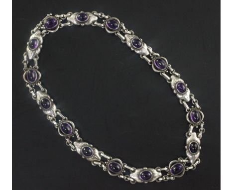 A Georg Jensen sterling silver and cabochon amethyst necklace, no. 57, set with sixteen amethysts, with Jensen box, 38.5cm.