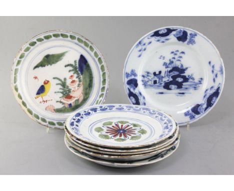 Seven English and Dutch delftware plates and dishes, c.1700-1760, four polychrome painted with floral designs, one polychrome
