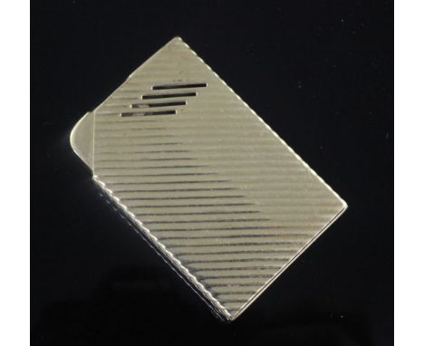 A Tiffany & Co ribbed 14ct gold lighter, signed, 57mm.