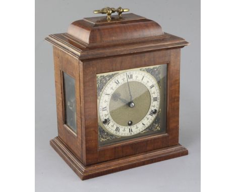 A 1930's walnut chiming bracket clock, copying a model by Thomas Tompion, height 11.5in.