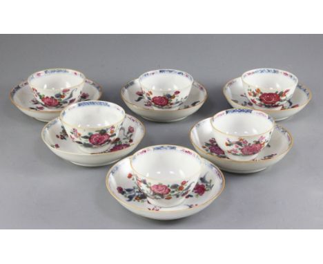A set of six Chinese famille rose and underglaze blue teabowls and saucers, Qianlong period, each painted with floral sprays 